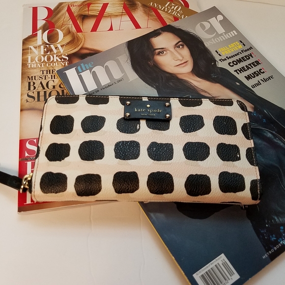 kate spade Handbags - Kate Spade Kaylie wallet black and pink